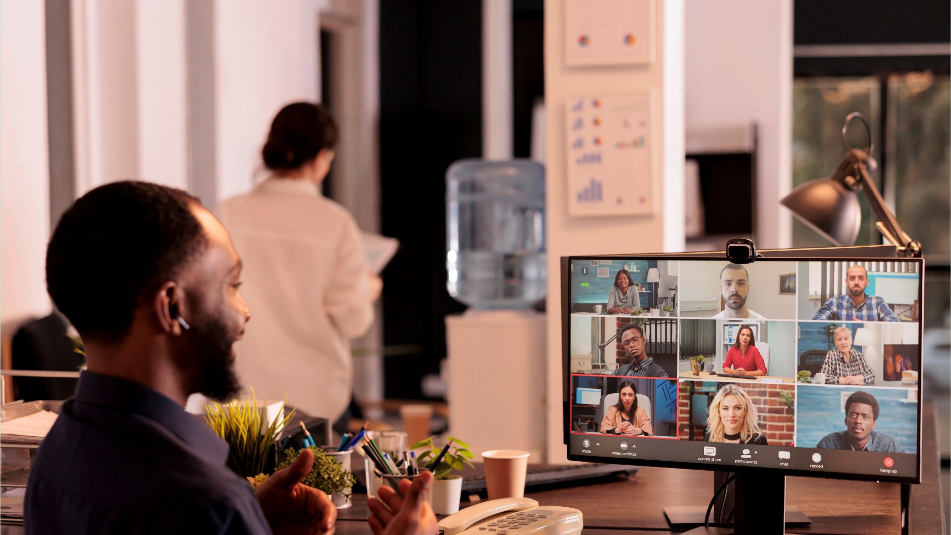 A professional on a video call with an international team